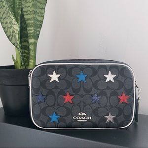 Star appliqué classic Coach signature handbag!